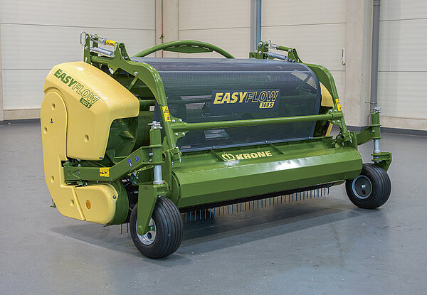 Mit Rollenniederhalter