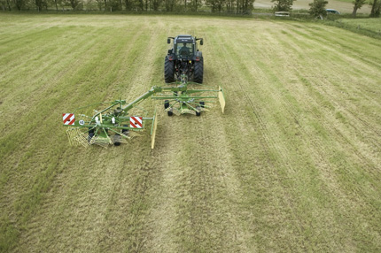 Swathing all material to the left, forming a twin swath